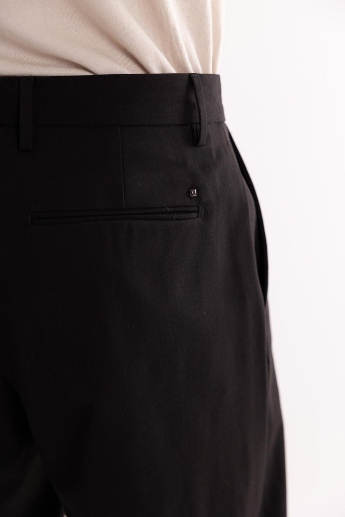 Pantalone a palazzo in tessuto fluido nero OF1F2W5P019 NERO OUTFIT 